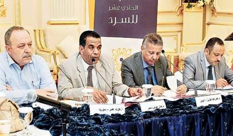 مع الدكتور عمر عبد العزيز، د. عادل عوض (مصر) والأستاذ عزت عمر (سوريا) في ملتقى الشارقة للسرد 2014م
